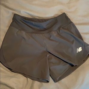 New balance mid rise 5in impact short black. Small